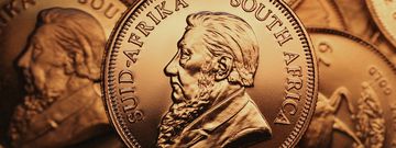 Several Krugerrand coins.